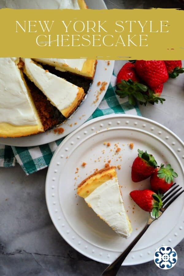 Top view of a slice of cheesecake on a plate with strabwerries and text on image for Pinterest.