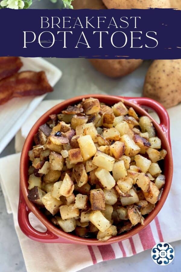 Red bowl of fried diced potatoes with text on image for Pinterest.