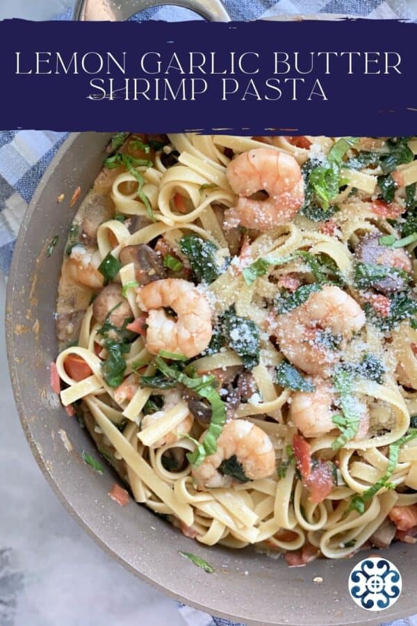 Top view of a skillet filled with Lemon Garlic Shrimp Pasta with text on image for Pinterest.