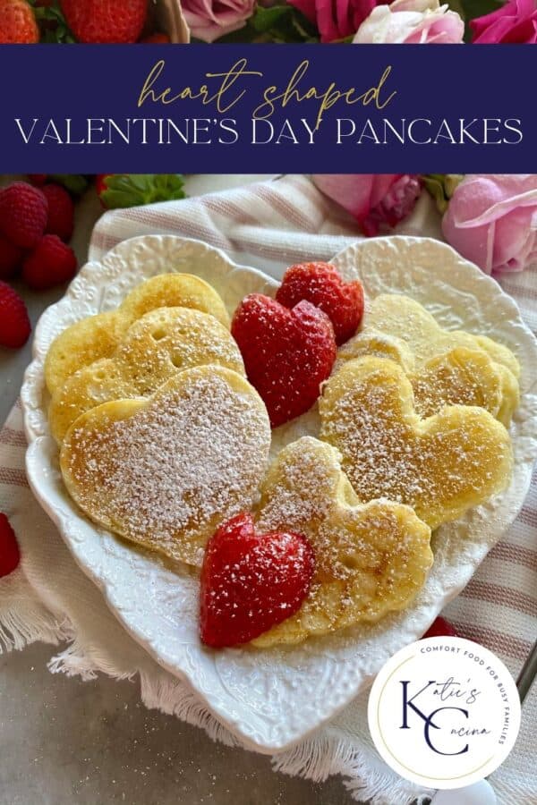 Heart shaped pancakes on a heart shaped plate with text on image for Pinterest.