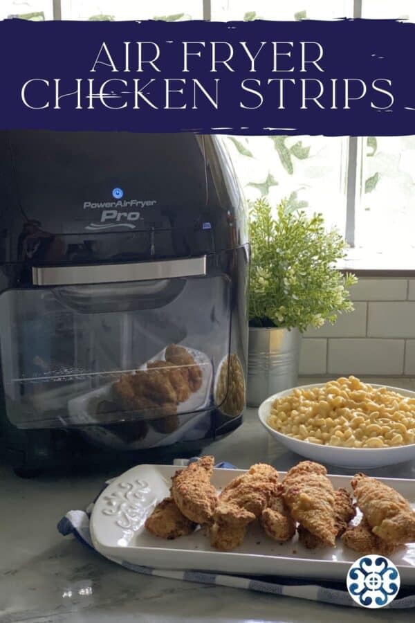 Chicken strips stacked with mac and cheese and air fryer in background with text on image for Pinterest.