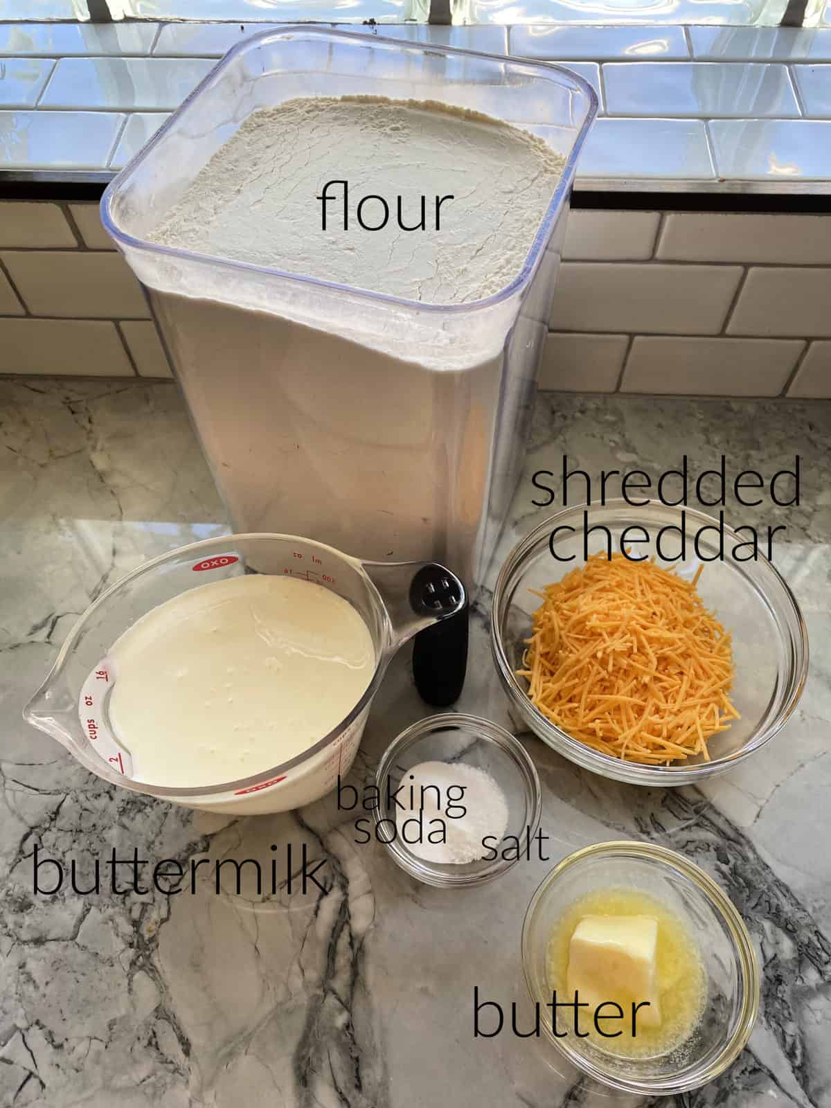 Ingredients: Flour, buttermilk, shredded cheddar, baking soda, salt, and butter.