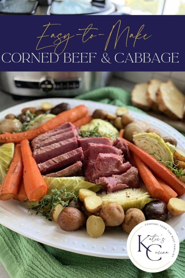 White platter filled with beef, cabbage, potatoes, and carrots with text on image for Pinterest.