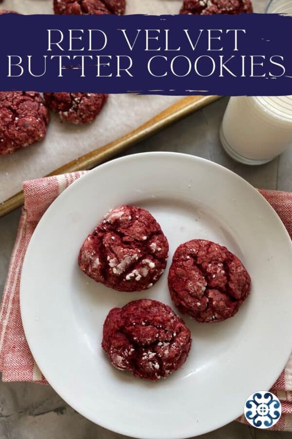 Top view of a three red cookies on a white plate with text on image for Pinterest.