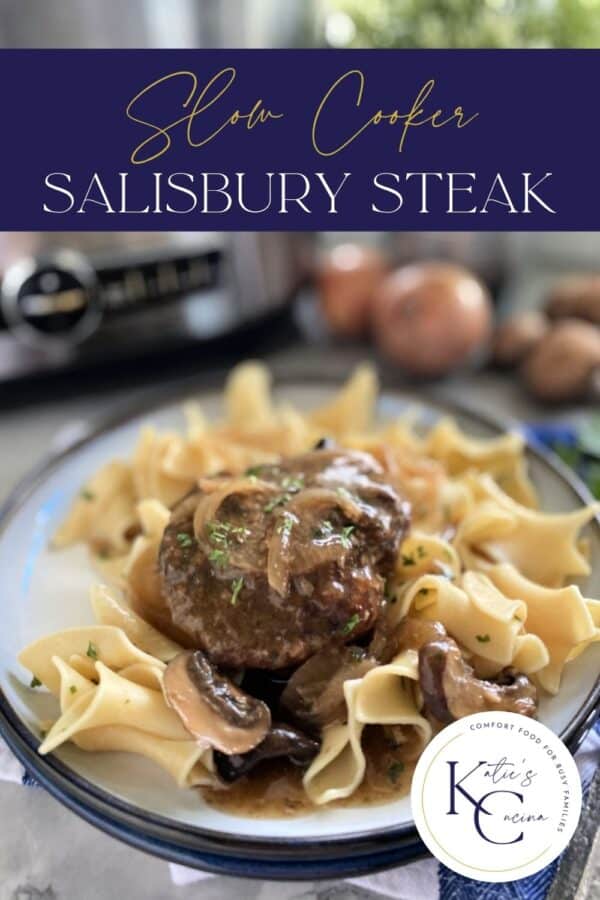 Ground beef steak with gravy and noodles on a white plate with text on image for Pinterest.