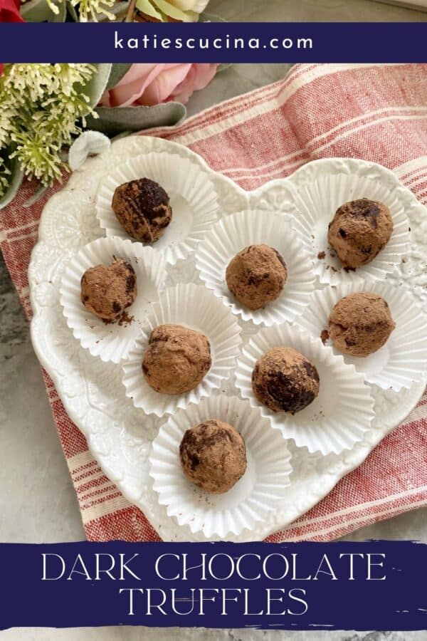 Top view of heart shaped plate filled with 8 truffles with text on image for Pinterest.