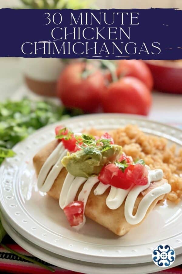 Fried Chicken Chimichanga with toppings resting on a white plate with text on image for Pinterest.