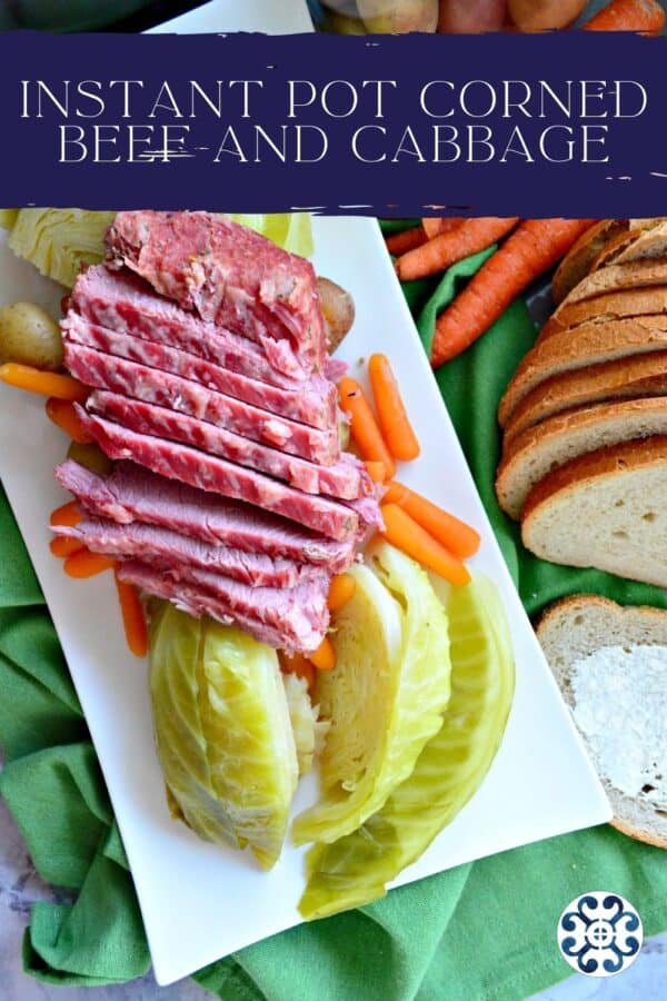 Top view of a white platter of corned beef, cabbage, carrots, and potatoes with text on image for Pinterest.