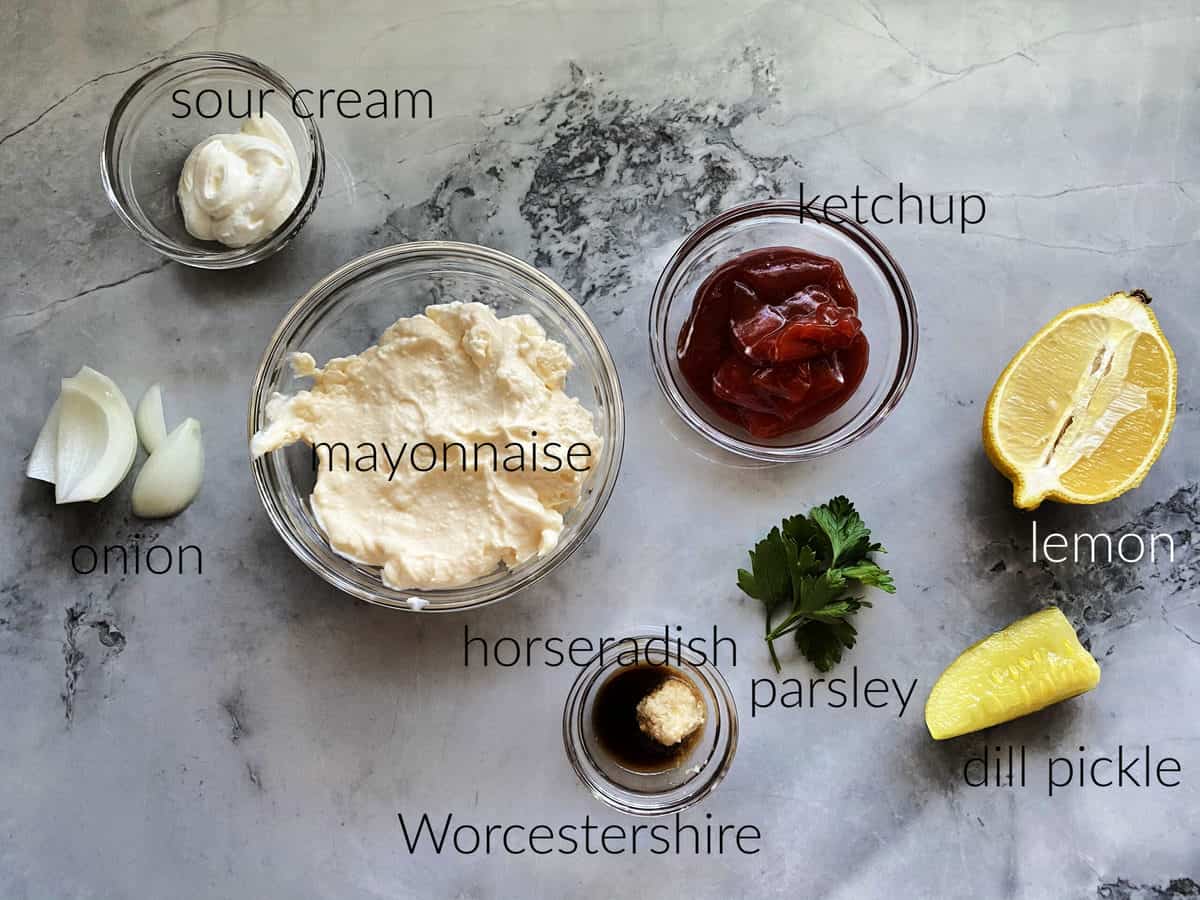 Ingredients: sour cream, mayonnaise, ketchup, lemon, parsley, dill pickle, onion, horseradish, and worcestershire sauce.