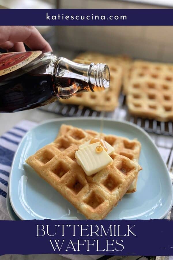 Hand pouring syrup onto waffles with recipe name on image for Pinterest.