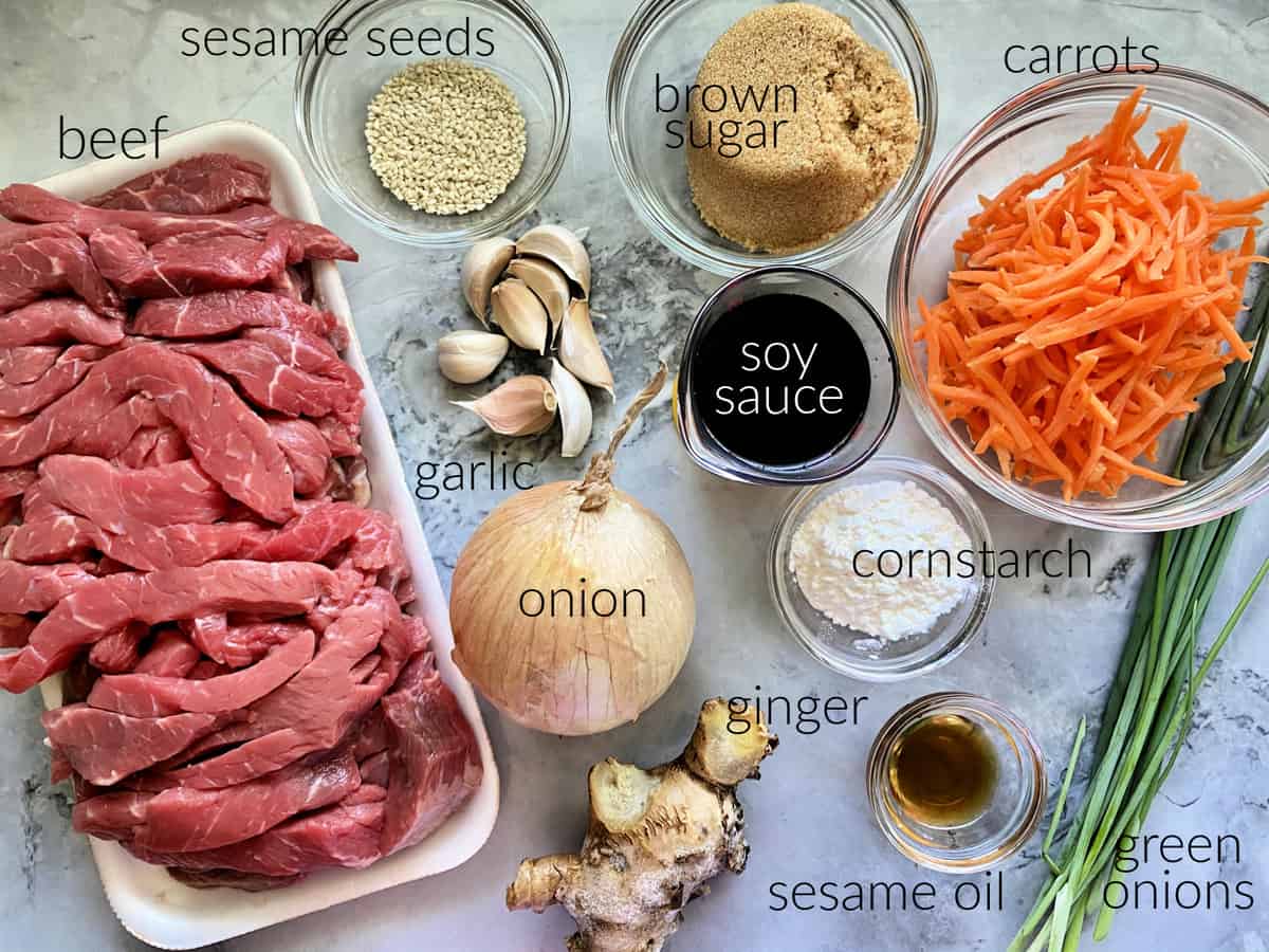 Ingredients: beef strips, sesame seeds, garlic, onion, soy sauce, brown sugar, ginger, sesame oil, green onions, carrots.