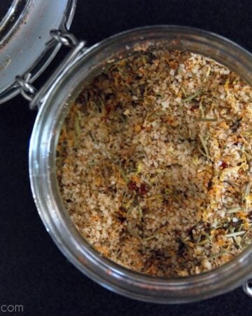 Top view of a glass jar filled with a seasoning.