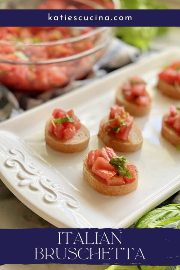 White tray with bruschetta on it with text on image for Pinterest.