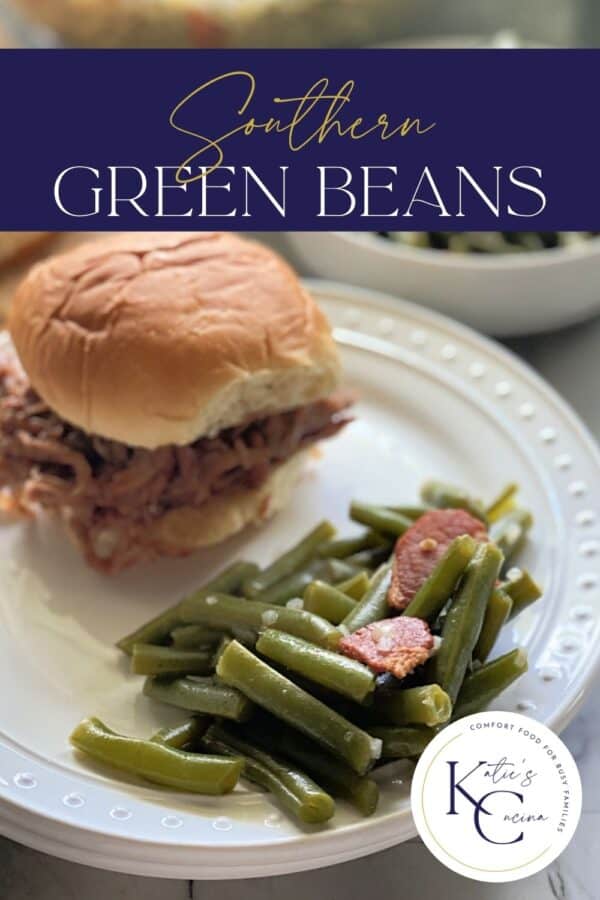 White plate filled with green beans and pulled pork sandwich with recipe title text on image.