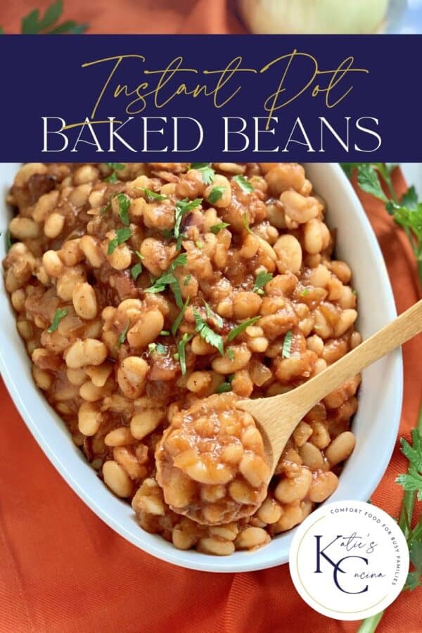 Top view of a bowl of baked beans with a spoon in it and text on image for Pinterest.