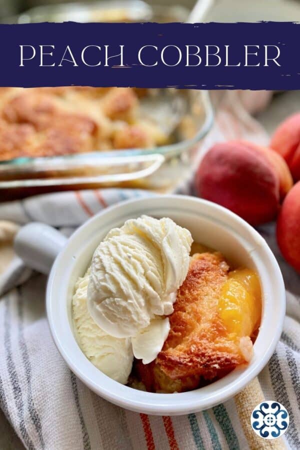 Top view of a white bowl filled with peach cobbler and ice creaam with text on image for Pinterest.
