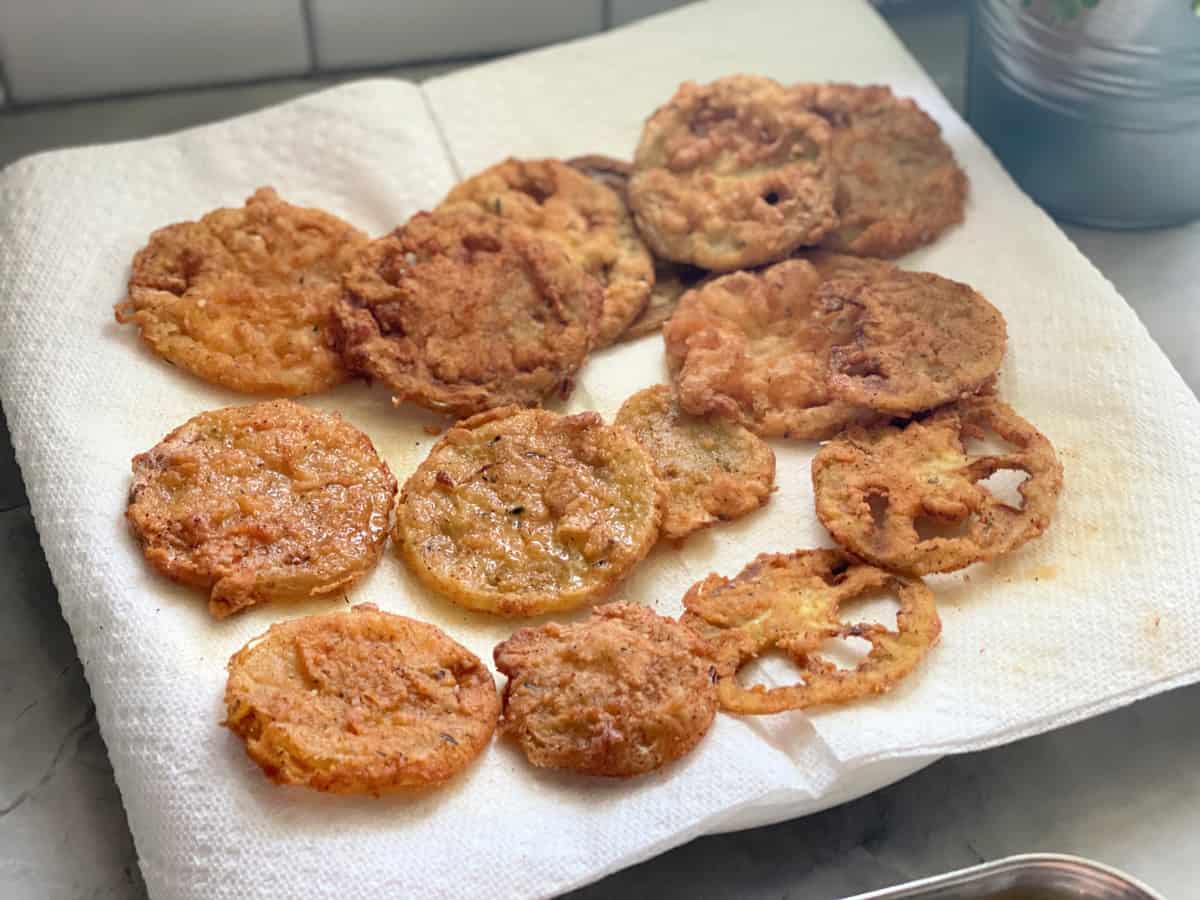 Paper towels on plate with Fried Green Tomatoes.