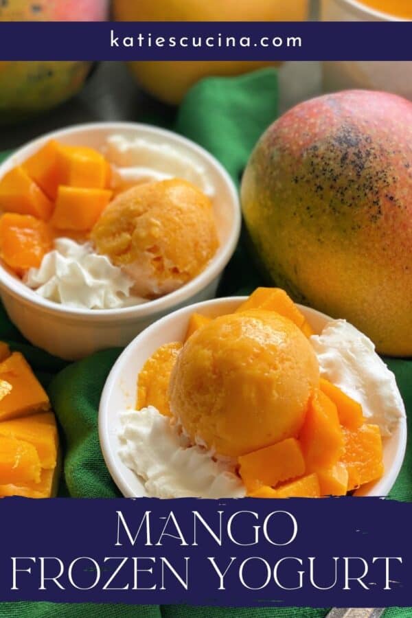 Two white dishes filled with Mango Frozen Yogurt on a green cloth with recipe title text on image for Pinterest.