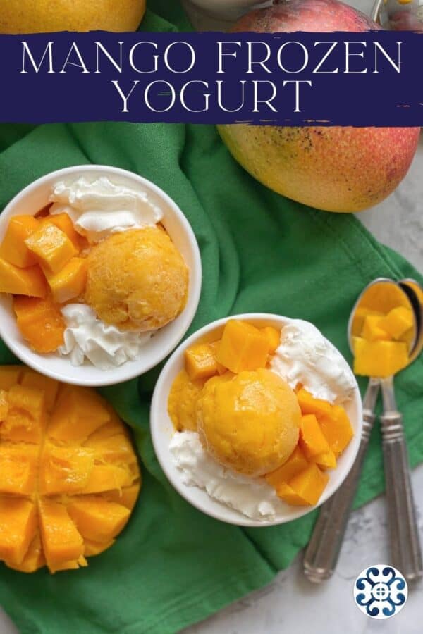 Top view of two white bowls filled with Mango Frozen Yogurt with recipe title text on image.