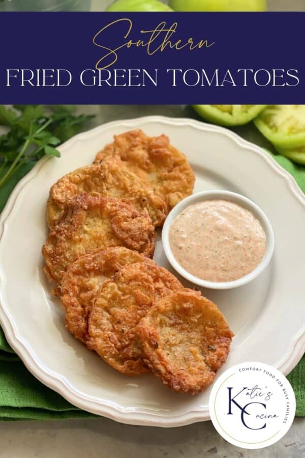 White plate with six golden Fried Green Tomatoes with dipping sauce and recipe title text on image for Pinterest.