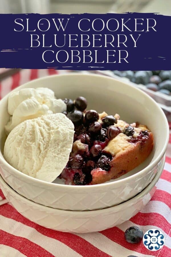 Two bowls stacked with blueberry cobbler and ice cream with recipe title text on image for Pinterest.