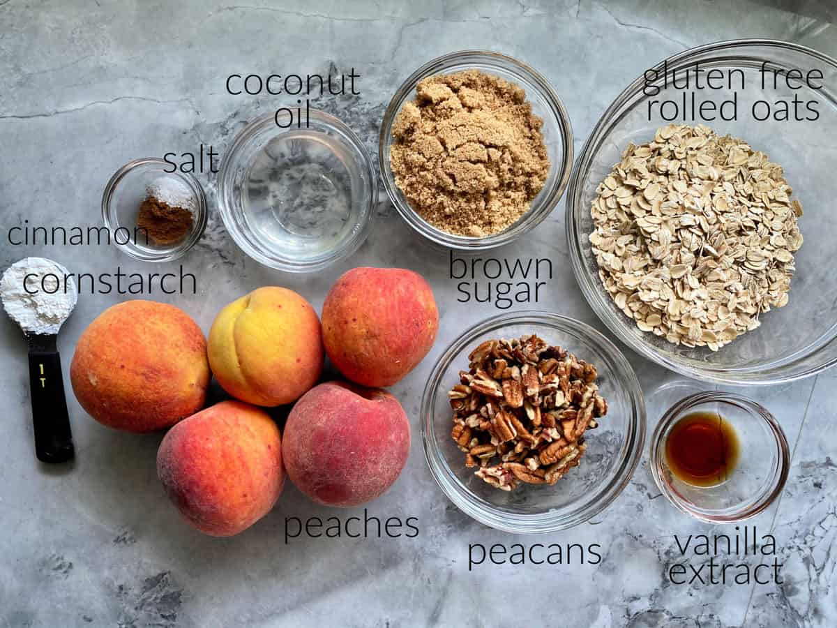 Ingredients: peaches, cornstarch, cinnamon, salt, coconut oil, brown sugar, pecans, gluten free rolled oats, and vanilla extract.