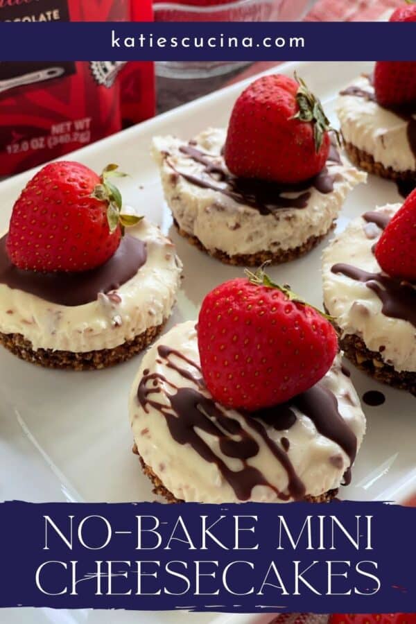 Close up of mini cheesecakes with strawberries and chocolate with recipe title text on image for Pinterest.