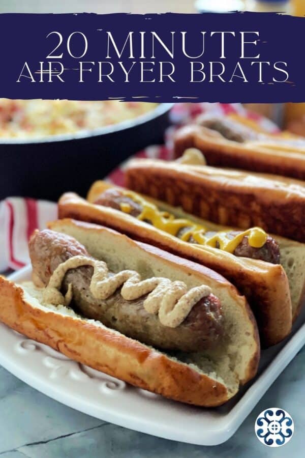 White platter with four pretzel buns filled with brats and mustard with recipe title text on image for Pinterest.