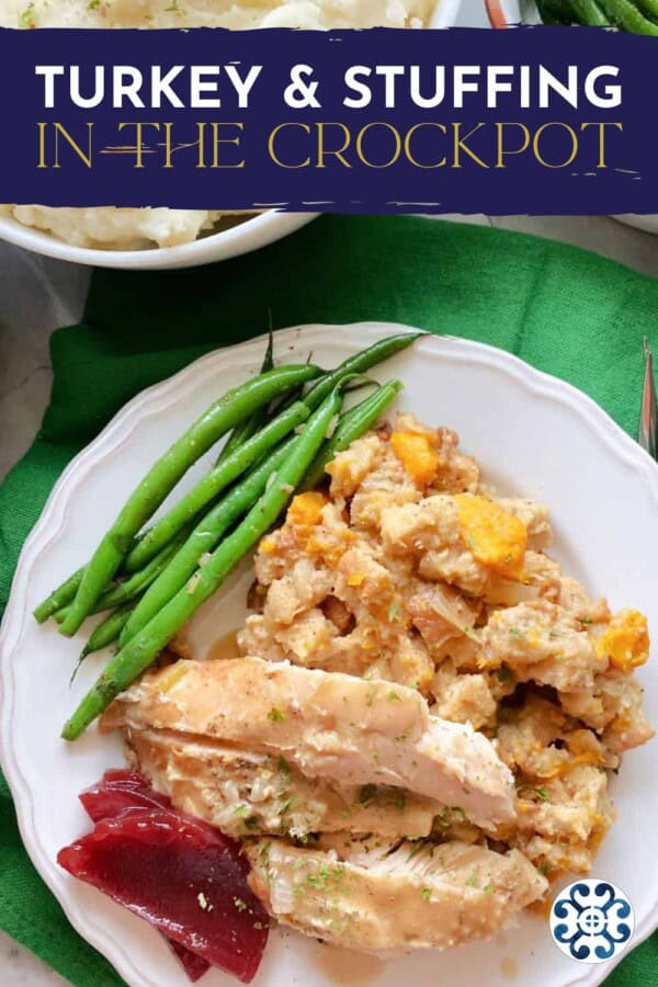 Turkey and stuffing on a white plate with text on image for Pinterest.