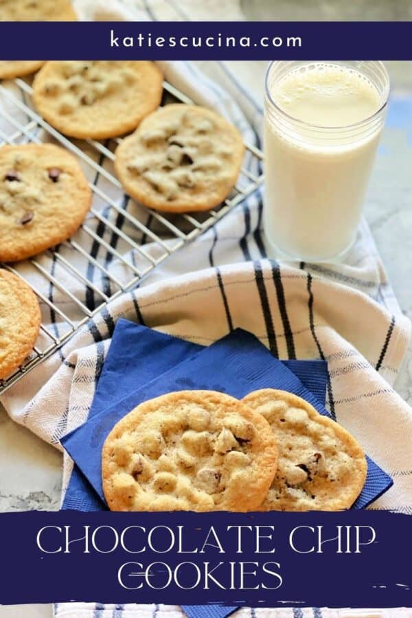 Two cookies stacked on blue napkins with recipe title text on image for pinterest.