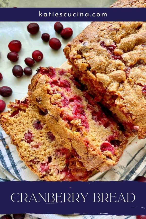 Top view of three slices of Cranberry Bread with recipe name text on image for Pinterest.