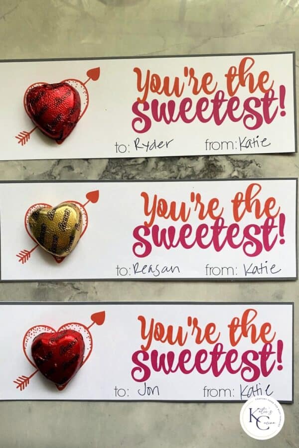 Three valentine's on a marble countertop with logo on bottom right corner.
