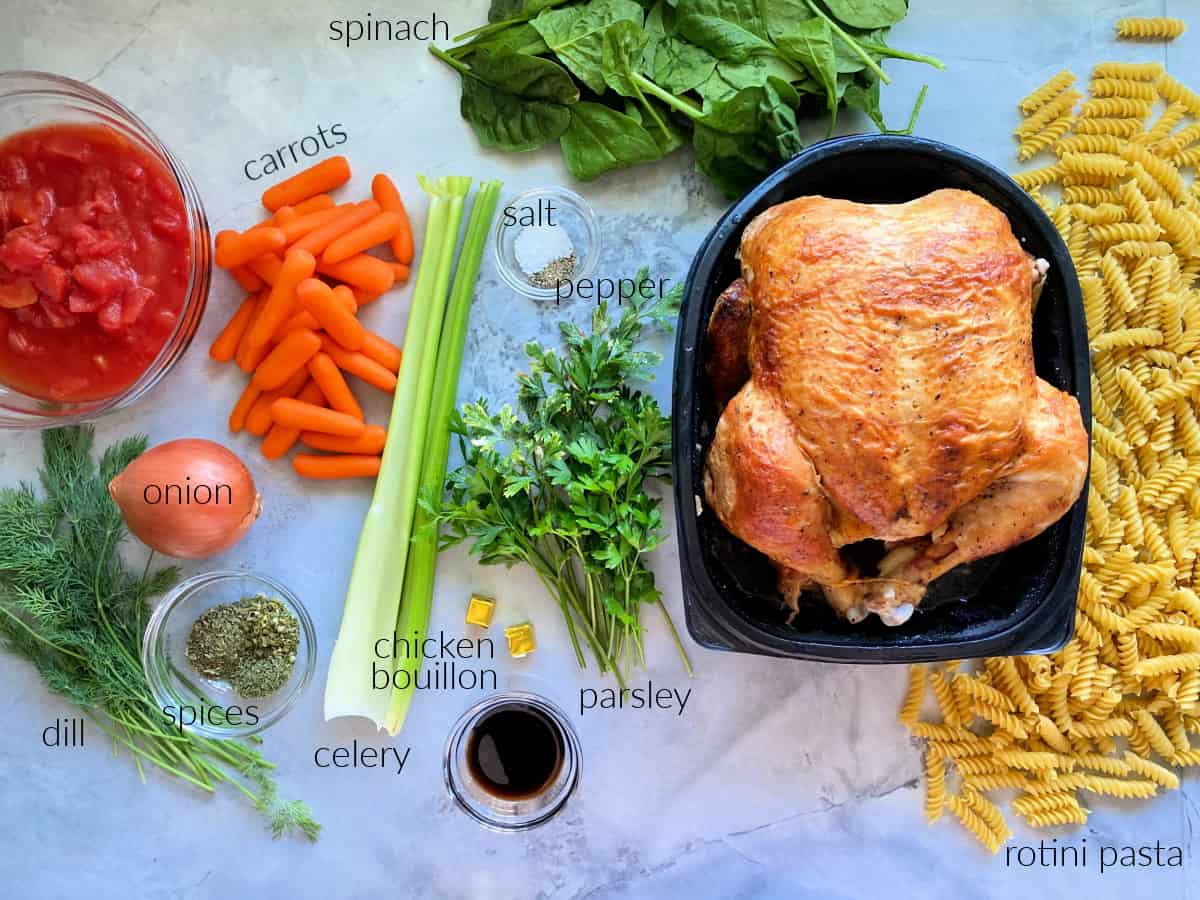 Recipe ingredients: dill, onion, spices, celery, chicken bouillon, parsley, pepper, salt, carrots, spinach, rotisserie chicken, and pasta