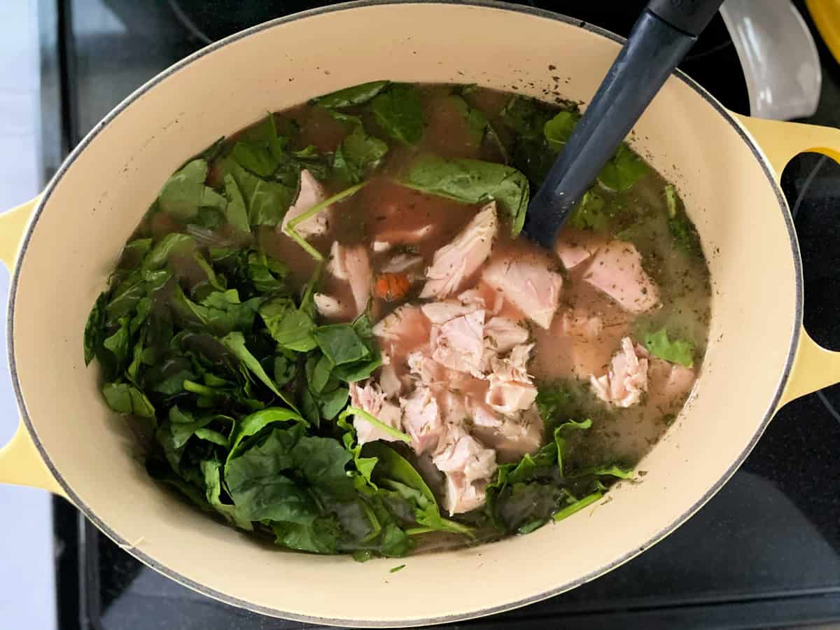 Spinach added to rotisserie chicken soup