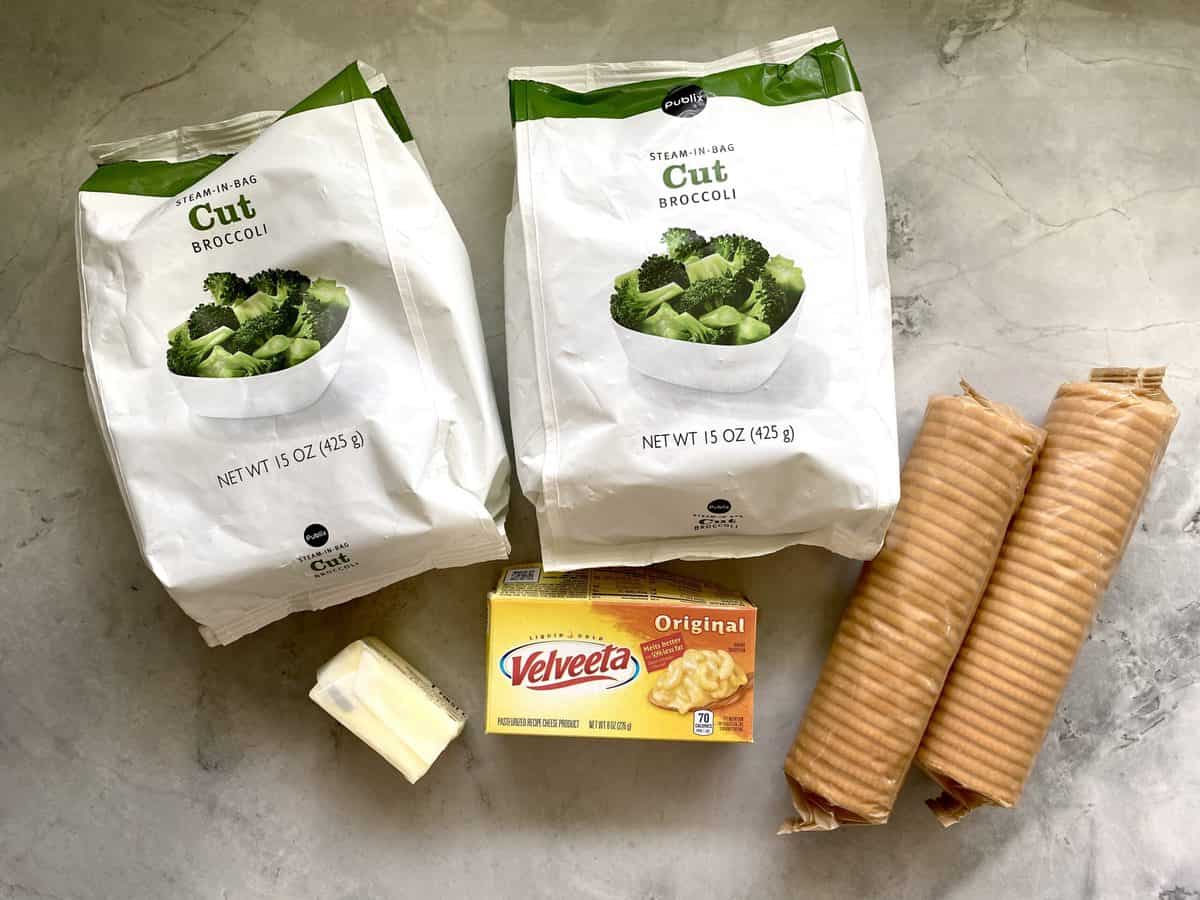 Recipe ingredients: two bags of frozen broccoli, two sleeves of ritz crackers, velveeta cheese, and butter