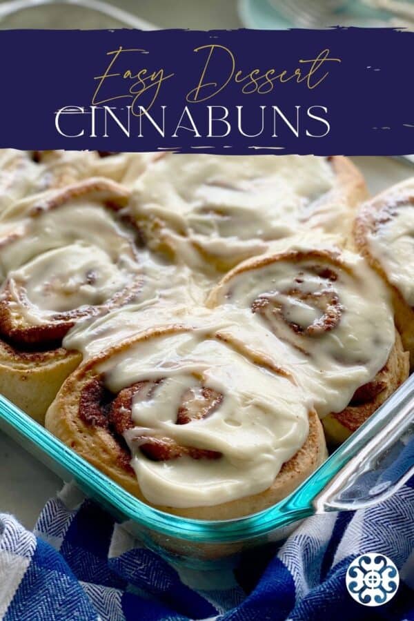 Glass baking dish with frosted cinnamon rolls with recipe title text on image.