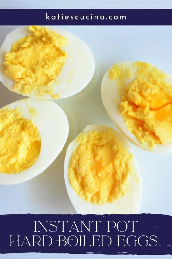 Four hard boiled eggs split open with recipe title text on image for Pinterest.