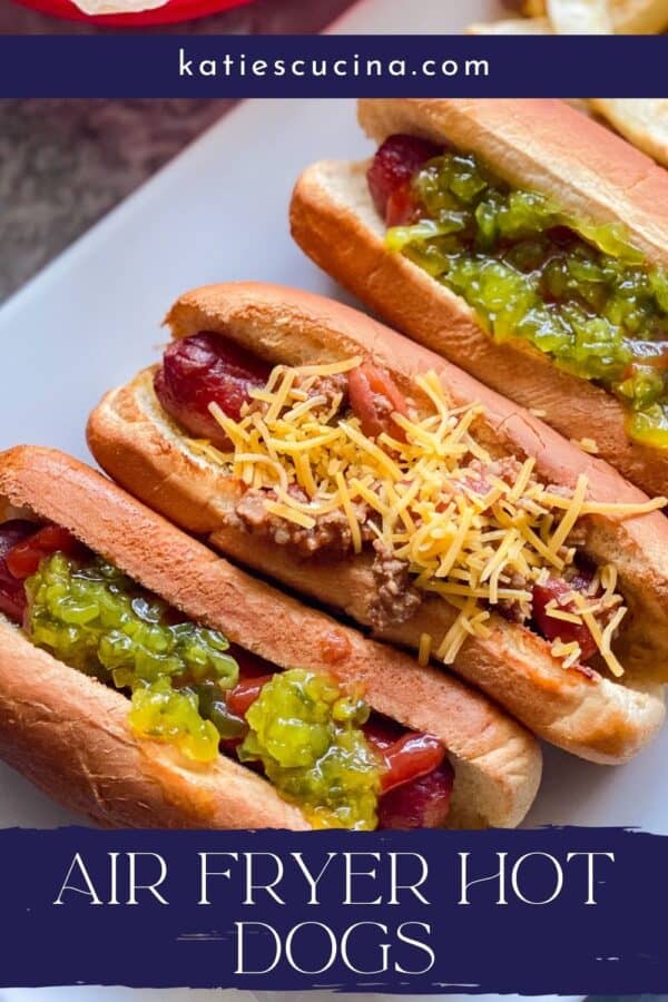 Three hot dogs with various toppings and recipe title text on image for Pinterest.
