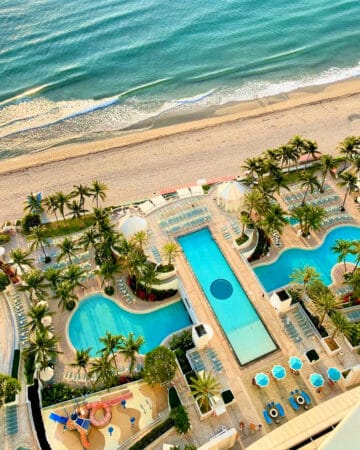 Arial view of three pools on the beach.