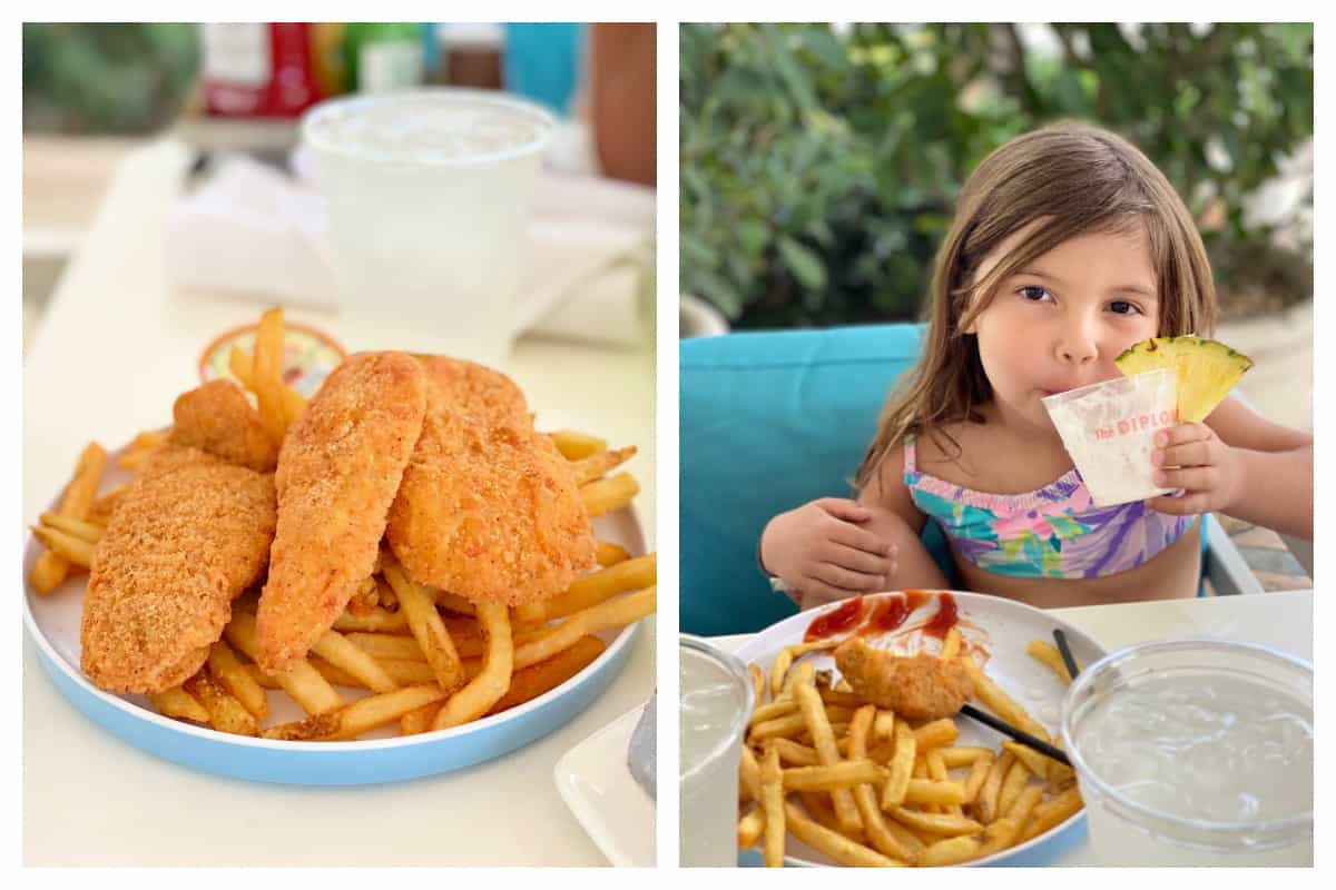 Chicken fingers and fries with a little girl drinking  a smoothie.