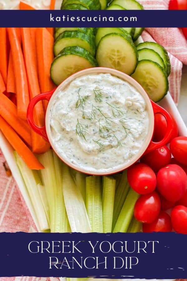 a white dip on a pltater full of veggies with recipe title text on image for Pinterest.