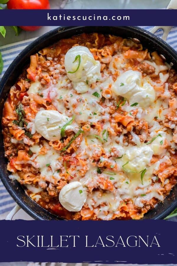 Black skillet with cooked lasagna in it and text on image for Pinterest.