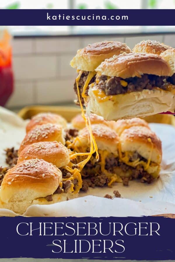 4 sliders being picked up by a spatula with cheesse dripping and recipe title text on image for Pinteressts.