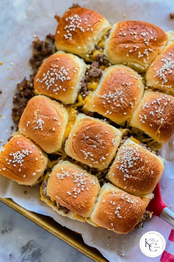 12 mini beef and cheese sliders with logo on right corner.