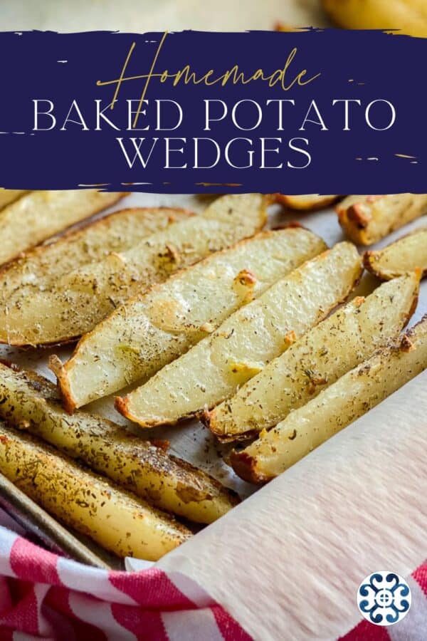 Baking tray with potato wedges with recipe title text on image for Pinterest.