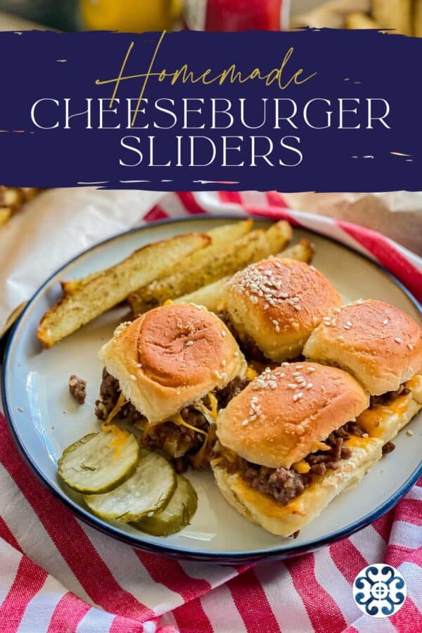 White plate filled with 4 cheeseburger sliders, 3 pickle slices and potato wedges with recipe title text on image for Pinterest.