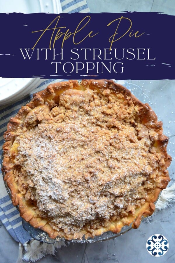 Pie with crumb topping with recipe title text on image for Pinterest.