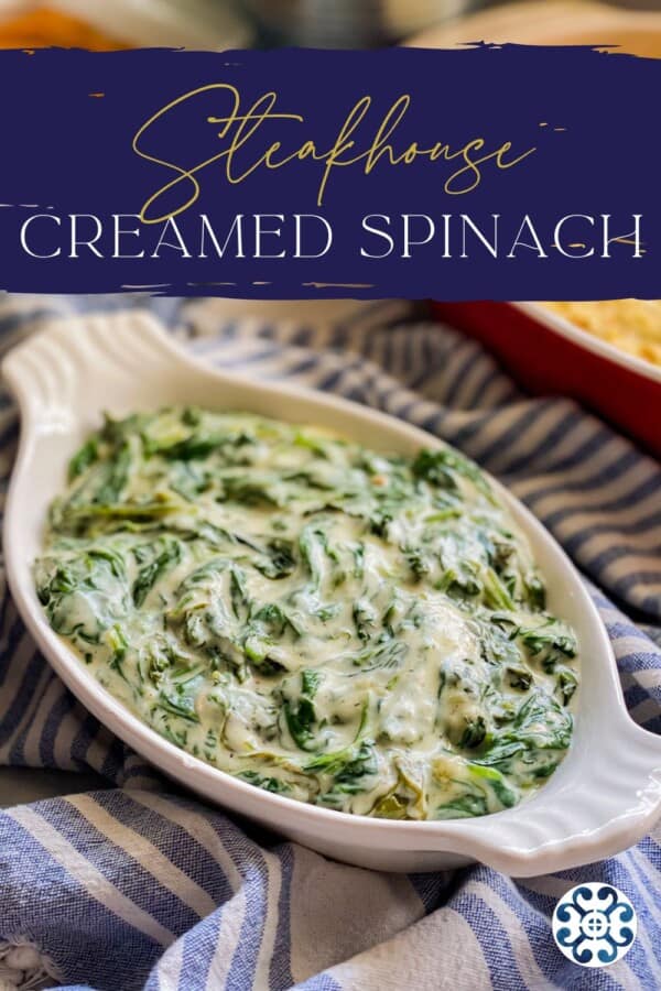 White oval dish with creamed spinach with recipe title text on image for Pinterest.