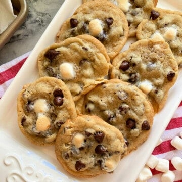 White tray filled with 8 chocolate chip cookies with marshmallows.