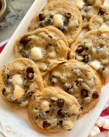 White tray filled with 8 chocolate chip cookies with marshmallows.